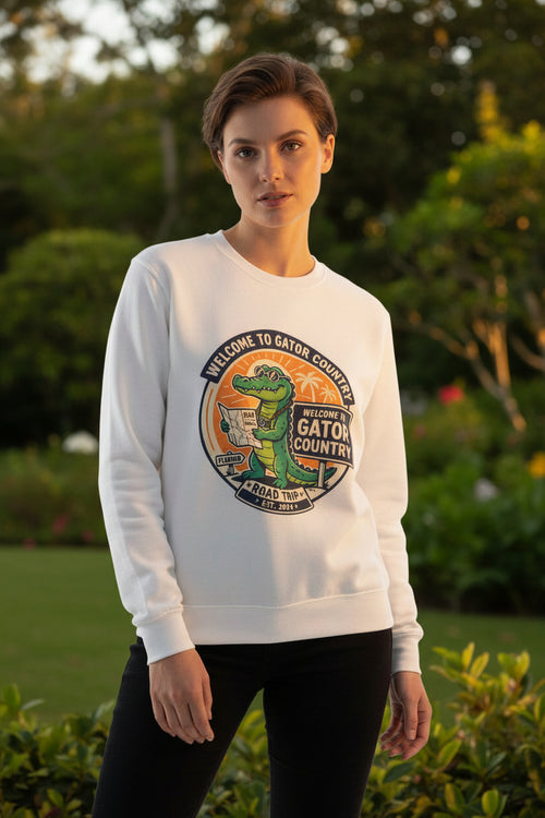 White sweatshirt with a graphic of a gator and text on a white background