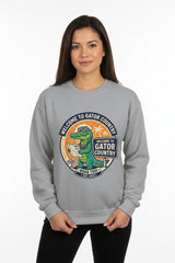 Gray sweatshirt with a graphic of a gator and text 'Welcome to Gator Country' on a white background