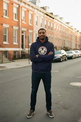 Navy blue hoodie with a colorful graphic on a white background