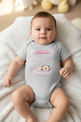 Gray baby onesie with a cartoon dog and text on a white background