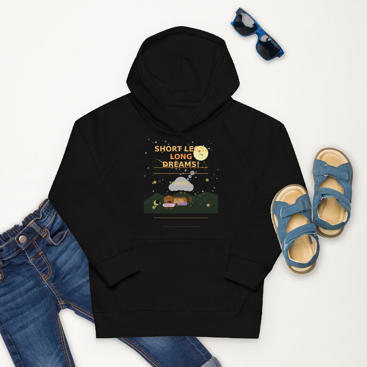 Black hoodie with gold logo and text, paired with blue jeans and sandals on a white background