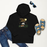 Black hoodie with gold logo and text, paired with blue jeans and sandals on a white background